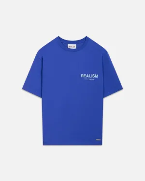 SSS REALISM BACK LOGO TEE ULTRAMARINE